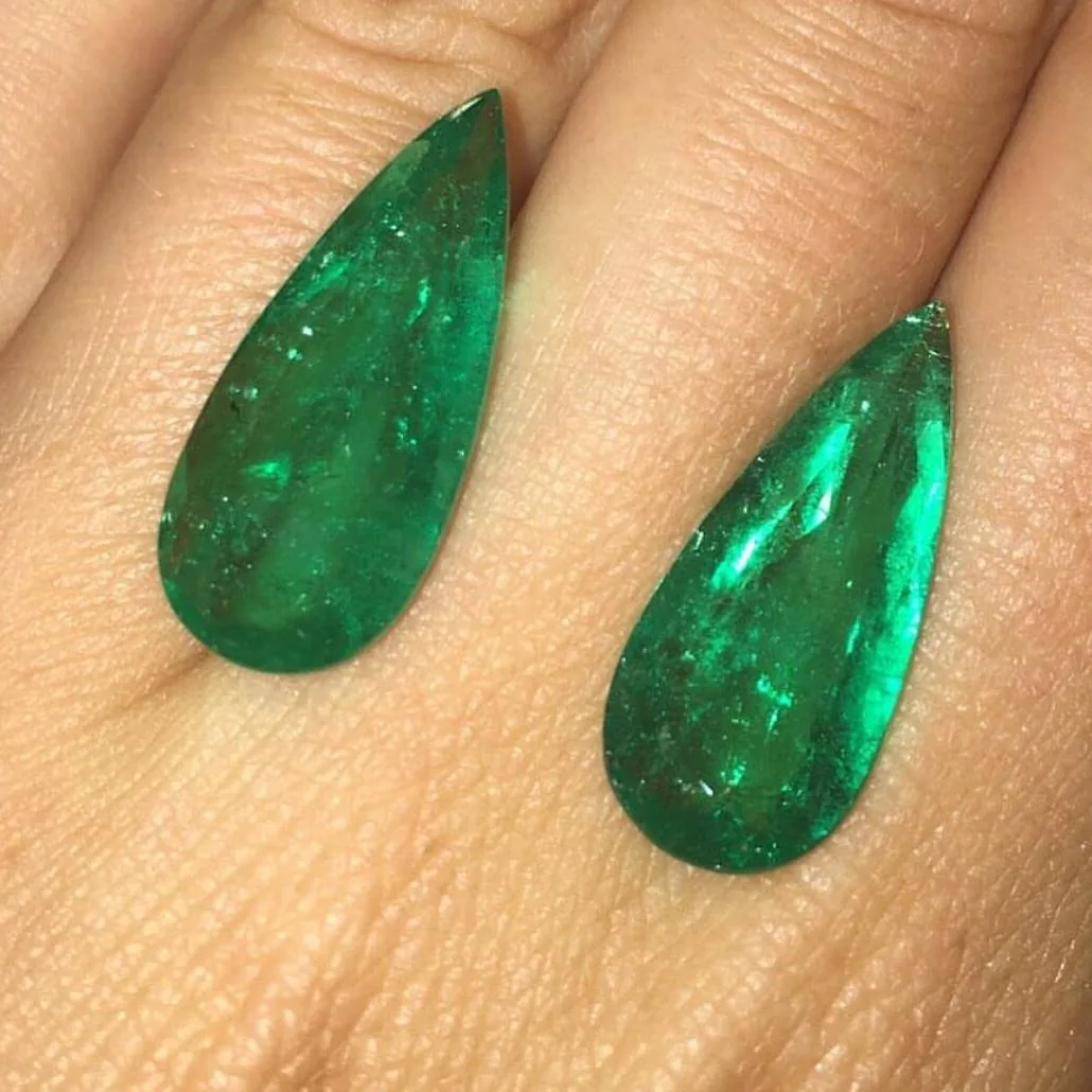 Emerald cabochon pair for emerald market notes